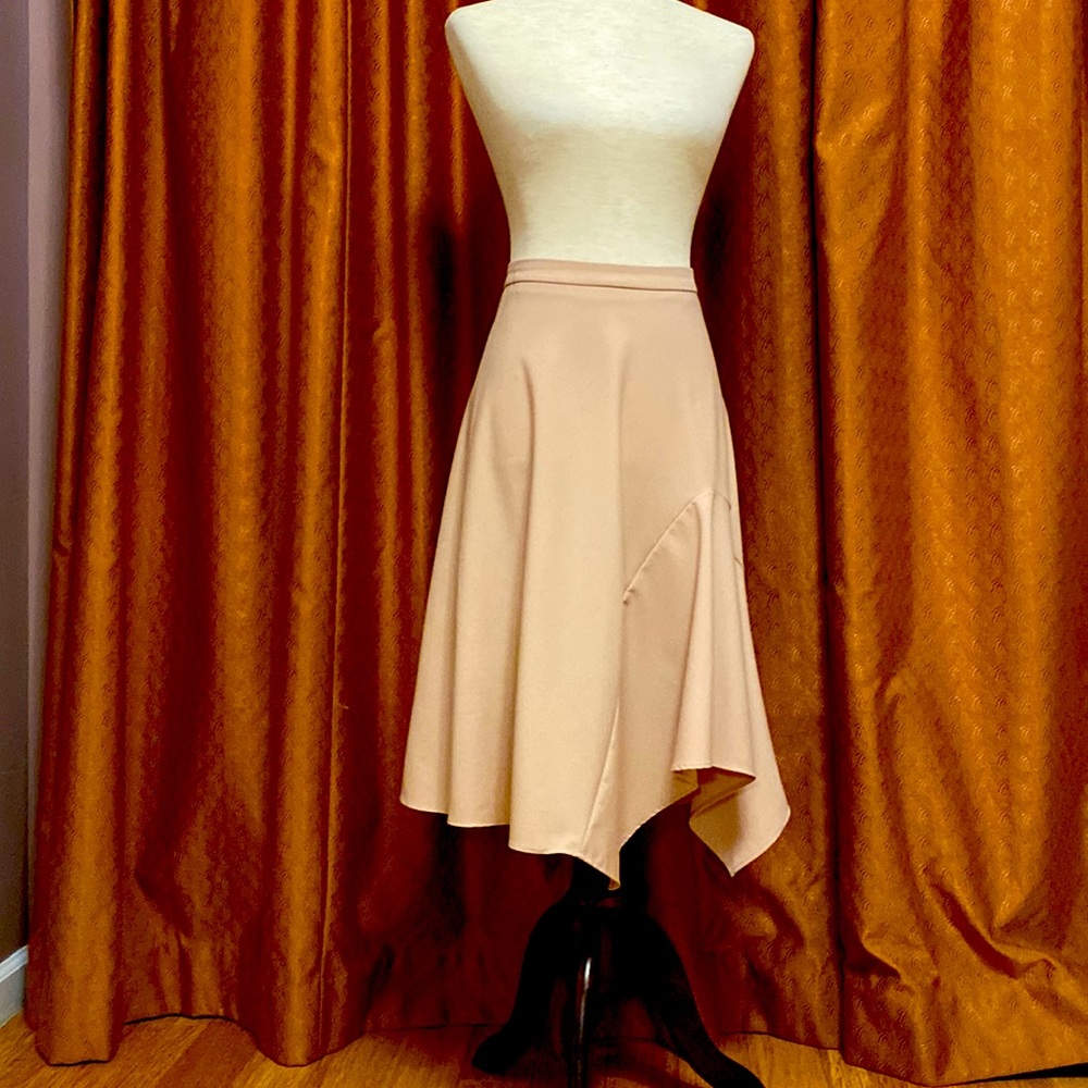 Dusty rose asymmetric skirt . Size L.